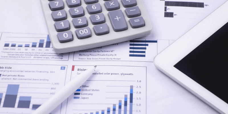 a calculator, finances, and tablet